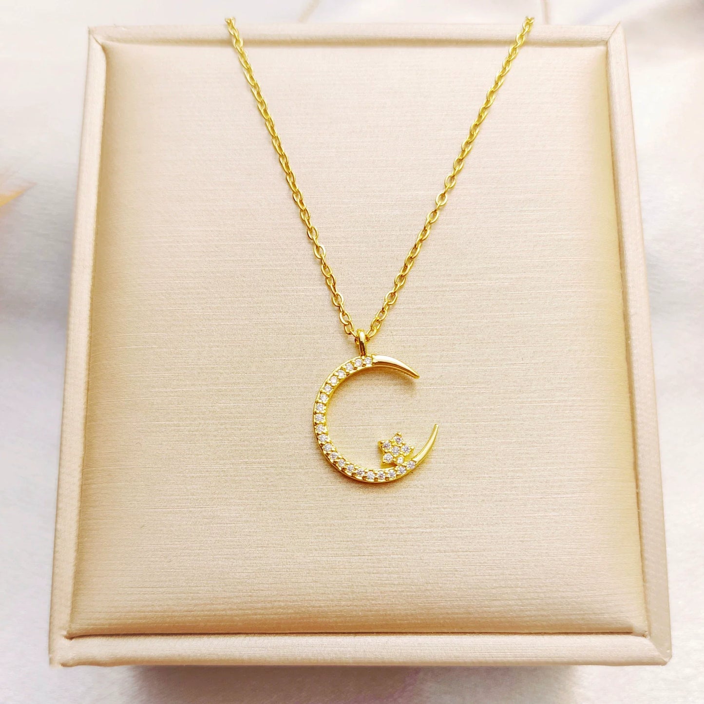 Ster/Maan Zirkonia Ketting | Symbolen van Hoop, Verandering en Kracht